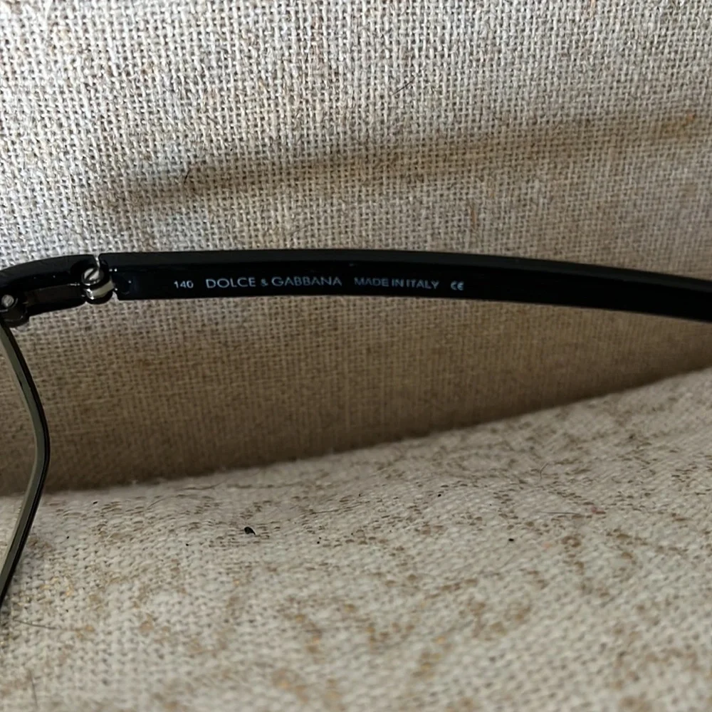 - Dolce and Gabbana black wire frame glasses